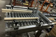 Приводной рольганг с механизмом переворота коробки АПК-11-22