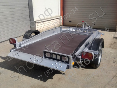 Прицеп с опускающейся платформой до 750 кг