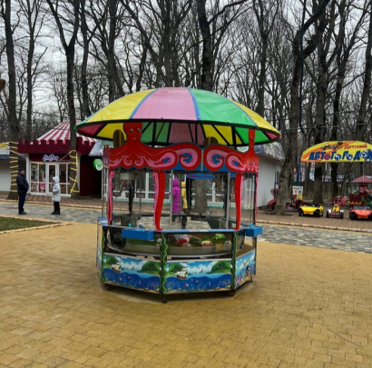 Игровой автомат Осьминожка с клешней и прищепкой